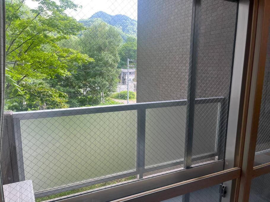 フューデイズコンドミニアム定山渓201号室 Apartment Сапоро Екстериор снимка